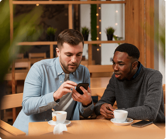 People looking at a phone